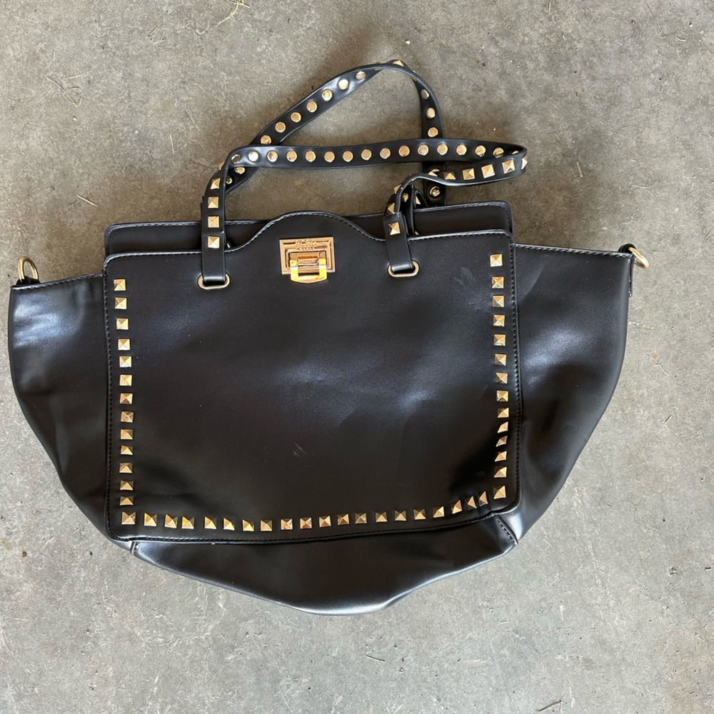 Black purse with gold